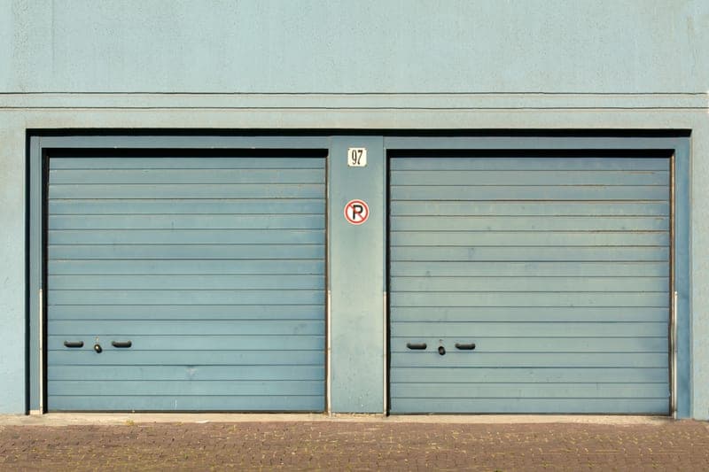 The bottom edge of a garage door, where a bottom seal fits - a stand-in for the M-D Building Products Garage Door Bottom Seal, not a photograph of this model