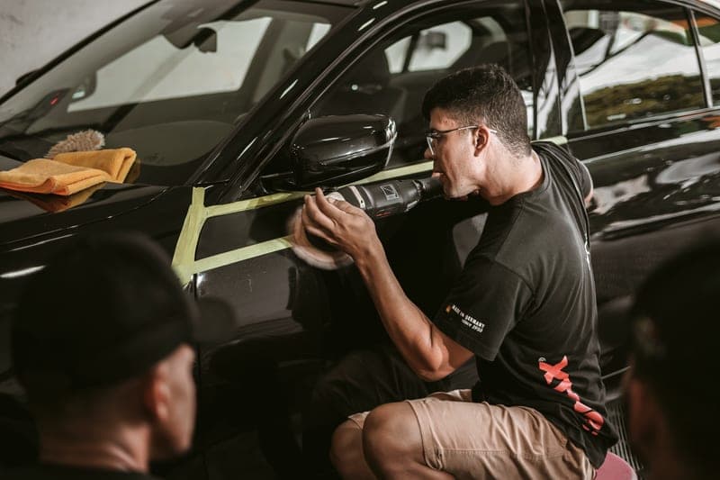 Paint sealant being applied to a car panel - a stand-in for the Turtle Wax Hybrid Solutions Ceramic Spray Coating, not a photograph of this model